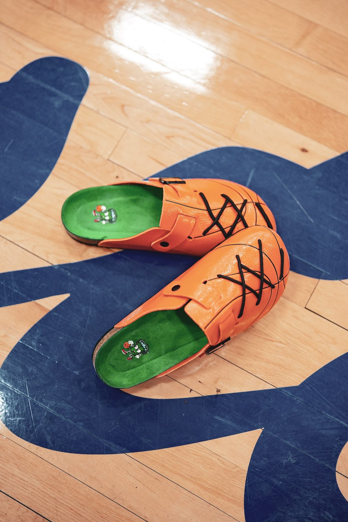 WB-001 clogs resting on the hardwood